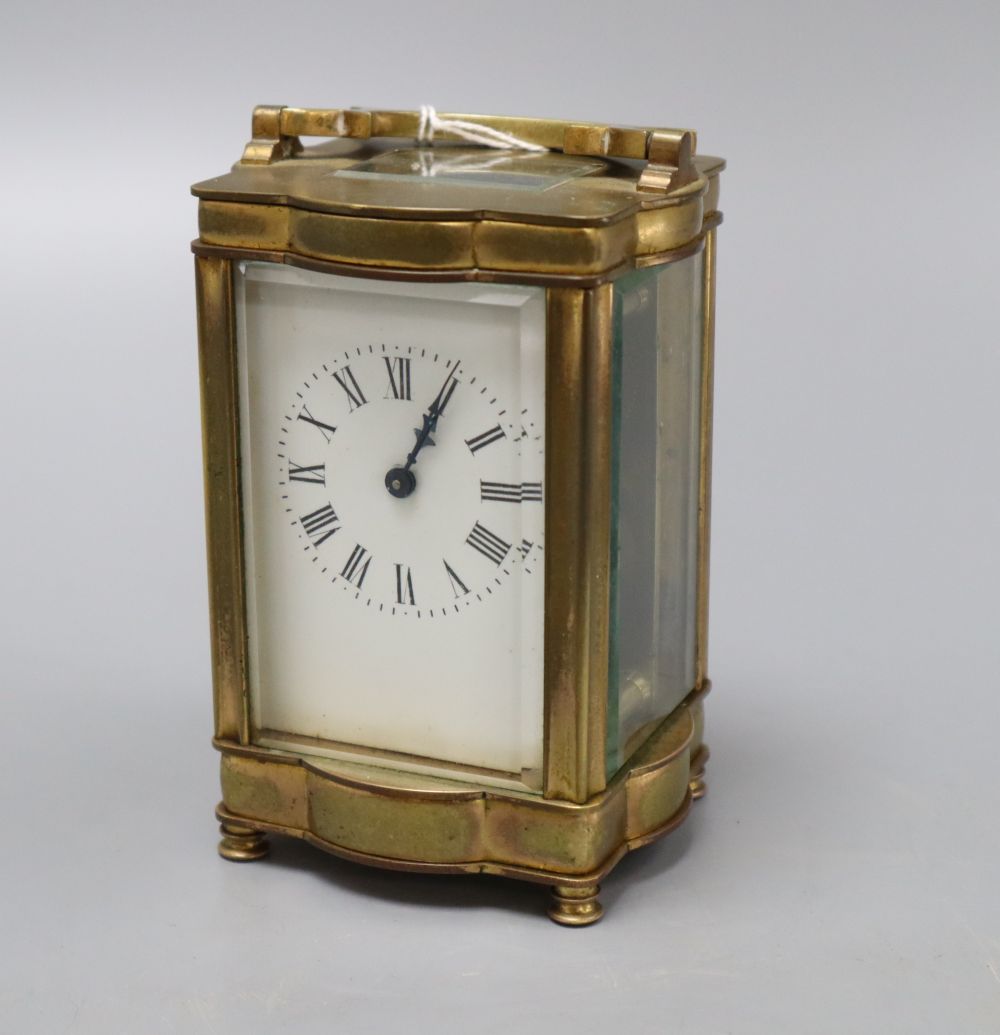 A brass cased carriage timepiece
